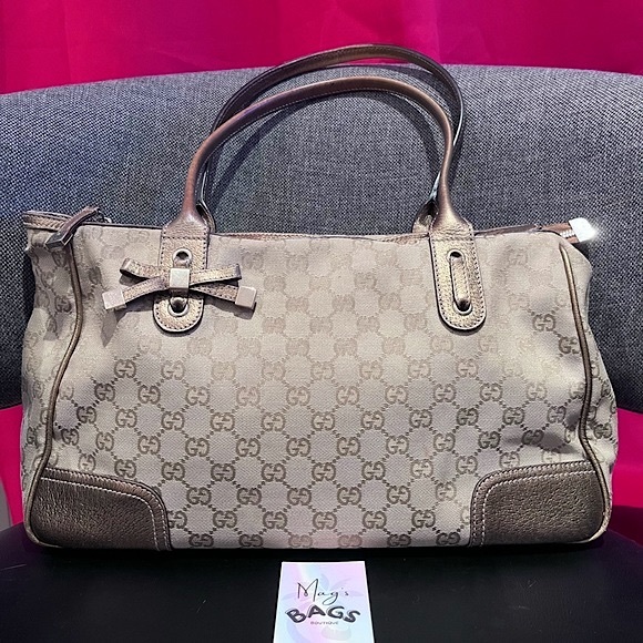 Gucci Handbags - Gucci: Metallic Bow Guccissima Princy GG Monogram Leather Zip Top Tote